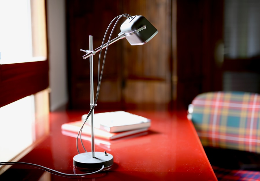 Photo "Modern metal long arm work light suitable for study room"